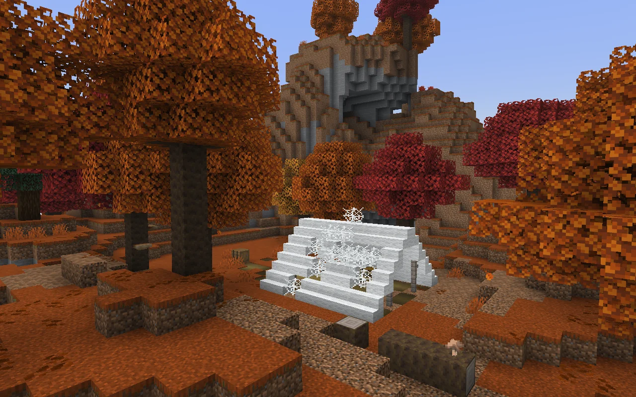 An abandoned white tent framed by orange and red poplar trees in Minecraft 26.3.